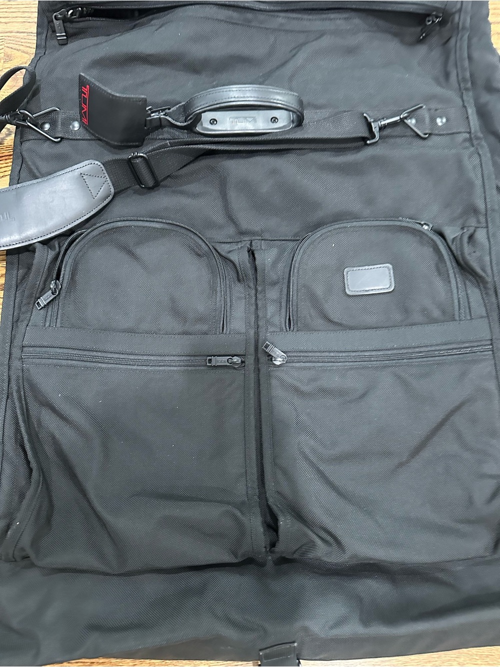 Tumi Black Travel Garment Bag with Dual Front Pockets and Shoulder Strap